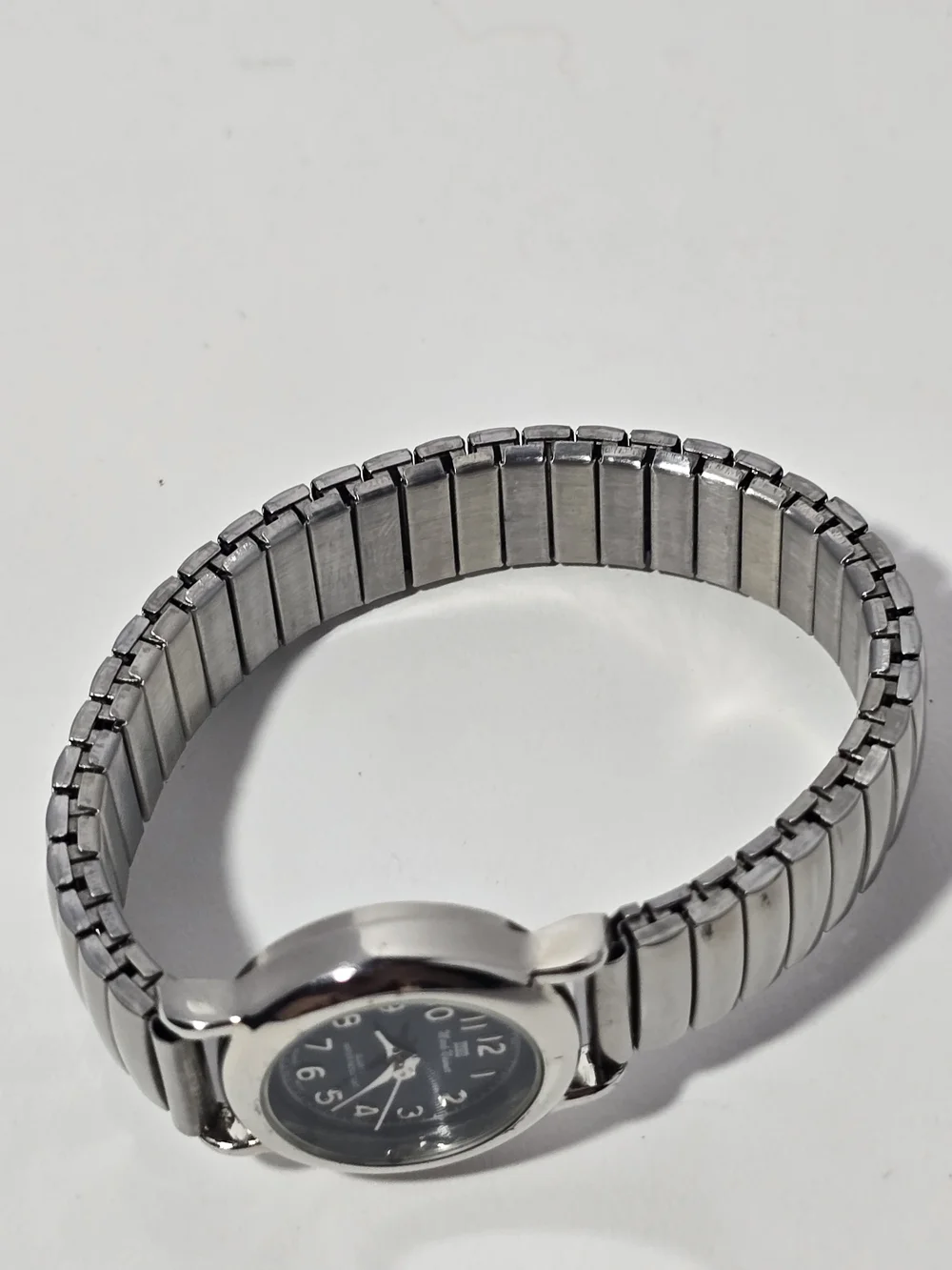 Vintage Mark Naimer Silver Tone Expandable Stretch Band Watch – Navy Blue Dial.